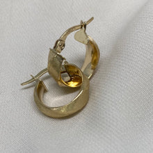 Load image into Gallery viewer, 10K Gold Diamond Cut Huggie Earrings

