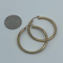 Load image into Gallery viewer, 1.54&quot; 10K Gold Diamond Cut Leaf Hoop Earrings
