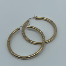 Load image into Gallery viewer, 1.54&quot; 10K Gold Diamond Cut Leaf Hoop Earrings
