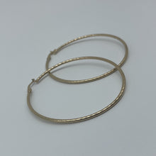 Load image into Gallery viewer, 10K Gold Gentle Twist Hoop Earrings
